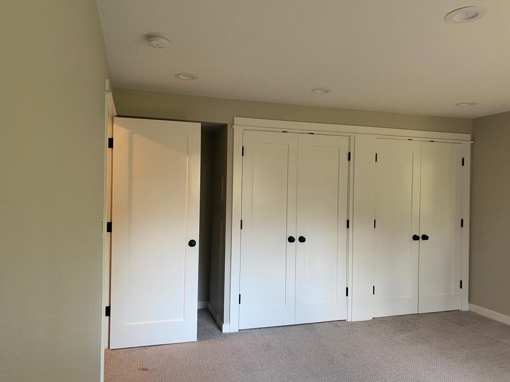 Remodeled closet with new built-in cabinet doors