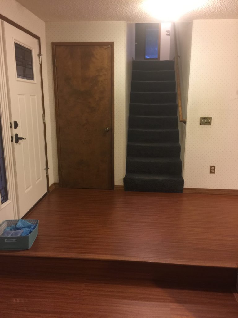 Stairway and entry before remodel